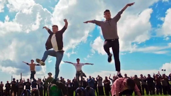 A cheery scene from the Chinese Communist Party Xinjiang musical “The Wings of Songs”. 