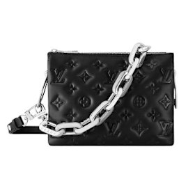 Simon can’t go without her Louis Vuitton cross-body bag.