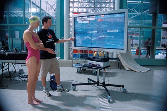 Former coach John Fowlie, pictured here at an AIS swimming facility in 2006, has decades of experience in and around the Australian Sports Commission.
