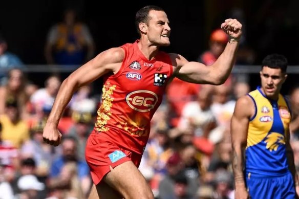 Gold Coast’s Jarrod Witts shows his delight after scoring a goal against the Eagles.