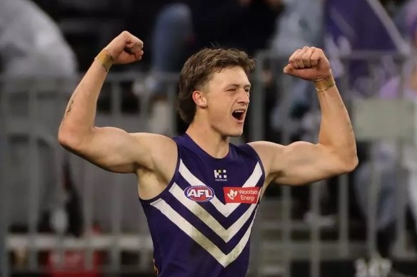 Jye Amiss flexes his muscles after kicking a goal in Perth as Dockers overpowered Tigers.