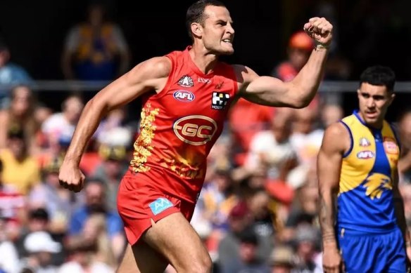 Gold Coast’s Jarrod Witts shows his delight after scoring a goal against the Eagles. 