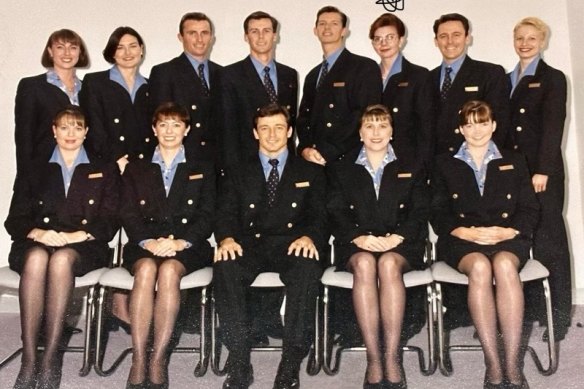 Lisa Lynn (top row, third from right) with cabin crew colleagues.