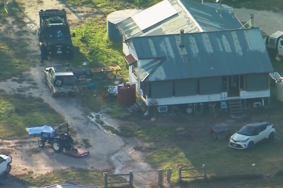 Tactical police moved in on the property under the watchful eye of two police helicopters.