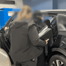 Woman arrested and charged with terrorism offences.