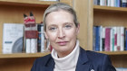 Alice Weidel, parliamentary group leader, party chairwoman and candidate for chancellor of the AfD, prepares for a live X interview with U.S. billionaire Elon Musk in her office in the Jakob Kaiser House in Berlin, on Thursday, Jan. 9, 2025. (Kay Nietfeld/Pool Photo via AP)