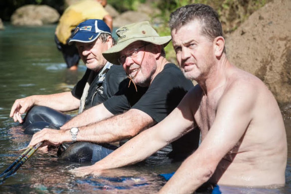 Tommy Raudonikis with Roy Masters and Phil Sigsworth during their adventures on the Kokoda Track in 2012.