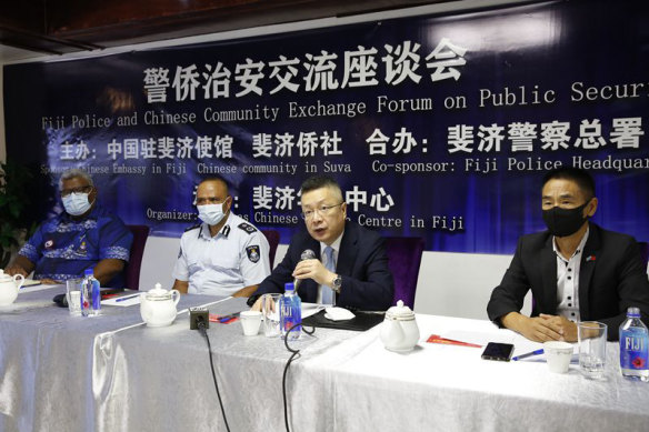 Zhao Fugang (far right) and Qian Bo (second from right), the Chinese ambassador to Fiji, at a 2021 forum sponsored by Fiji Police.