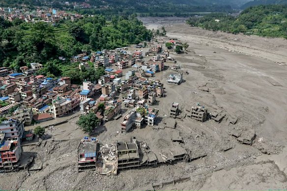 The tidal wave of mud, rock and water devastated towns and villages along the bank of the Lhende River.