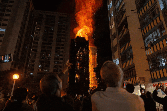 Hong Kong fire: Multiple dead, hundreds missing in fire engulfing apartment  buildings