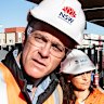 Premier Chris Minns tours the new metro train platforms at Bankstown station on Monday.
