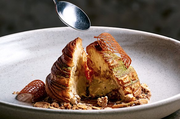The interior of the pear-shaped croissant dessert, filled with pear compote and hojicha ice-cream.
