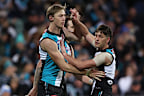 (L-R) Todd Marshall and Zak Butters in action for the Power.