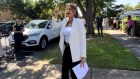 Ray White auctioneer Angela Limanis calls an auction in Cheltenham, Melbourne, over the weekend.