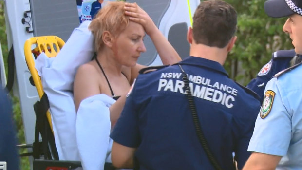 The 45-year-old woman managed to pull herself back onto the rocks, but found her partner was missing.