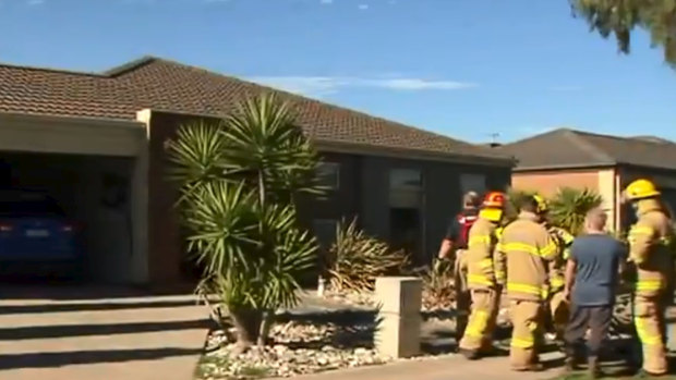A family of three was taken to hospital after a house fire in Tarneit which was reportedly sparked by a computer charger.