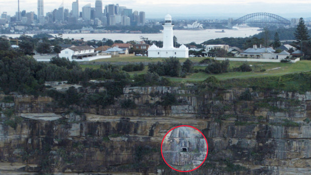 The entrance to the tunnel (circled) below the lighthouse.
