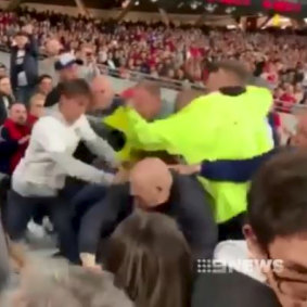 Vision of a fan brawl at Optus Stadium has gone viral. 