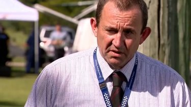 Detective Inspector David Harbison speaks to journalists after police found an elderly man’s body and a seriously injured woman during a welfare check.