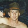 A photo of Brenden Abbott, the Postcard Bandit, at a Gold Coast hotel swimming pool circa 1995.