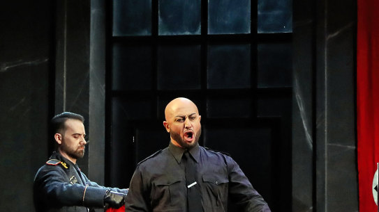 Marco Vratogna as Scarpia and Diego Torre as Cavaradossi in the climactic torture scene.