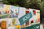 Rate hike double blow threatens bigger home price slump.