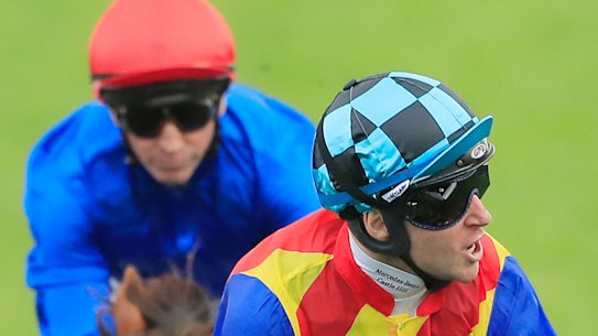 Tommy Berry looks to the stands  in triumph after Pierata wins The Shorts in style at Randwick on Saturday.