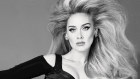 Adele is the cover model for two editions of Vogue magazine.