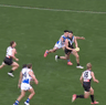 ‘That’ tackle from Paul Curtis on Port Adelaide’s Josh Sinn.