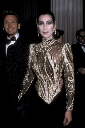 Designer Bob Mackie and Cher attend The Metropolitan Museum of Modern Art exhibition, 1985.