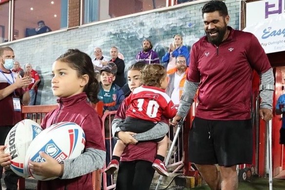 Mose Masoe walks out at Hull’s Craven Park ground with children Marlowe, Evie-Rose and Lui.
