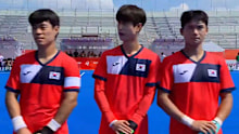Players from South Korea are left confused after hearing the wrong anthem played.