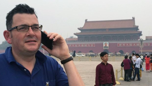 The photo the premier now regrets that was taken of him during a 2015 China trip.