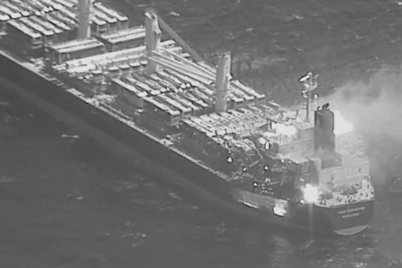 This black-and-white image released by the US military’s Central Command shows the fire aboard the bulk carrier True Confidence after a missile attack by Yemen’s Houthi rebels.
