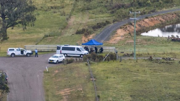 Police divers arrive at the scene.
Police have blocked off Hazelton Road, Bungonia, to everyone but residents as they search for the bodies of  the two missing men.