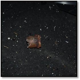 Shrapnel discovered in the driver's side footwell.