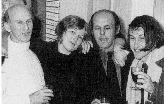 Liz Fell with (from left) .Jim Staples, Leon Fink and Bob Ellis at a party in 1996.