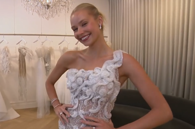 Annalise Dalins tries on her outfit for the 2026 Brownlow Medal