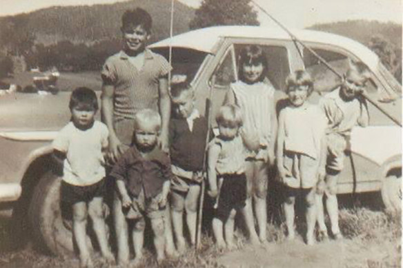 Sally Treveton’s family in the 1950s. It depicts some of her grandmother’s siblings and visiting cousins. The great-uncle on the far left was removed from the family and sent to an institution for being ‘uncontrollable’. 
