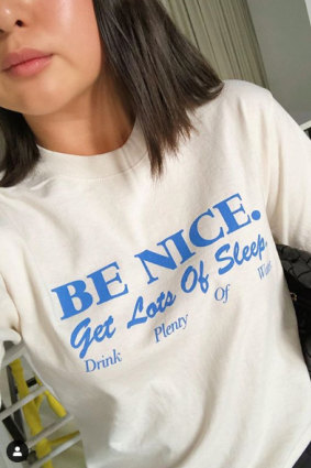 Harper's BAZAAR fashion editor Caroline Tran dons the popular slogan T-shirt.