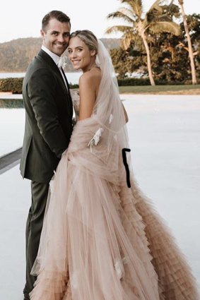 Deborah Symond in her $200,000 Christian Couture wedding gown with Ned O'Neil on their wedding day at Qualia.