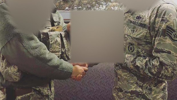 The Nigerian man allegedly used these photos of a United States soldier and posed as him to lure a Brisbane woman into handing over hundreds of thousands of dollars.