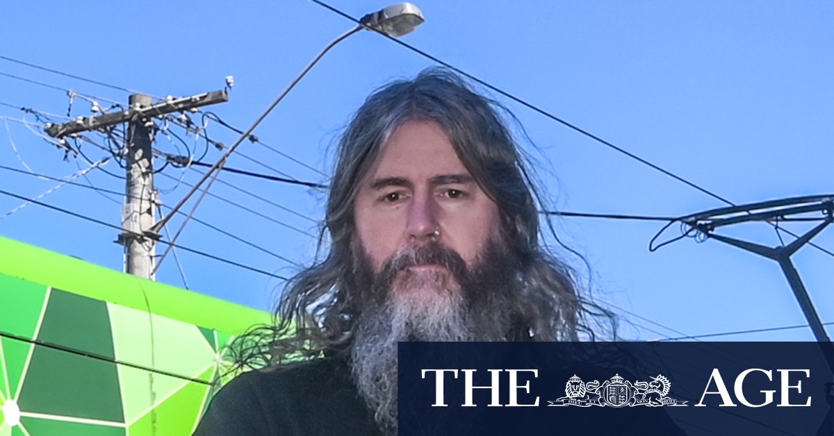 His shop is covered in sand, crushed by the trams outside. He worries about the health risks