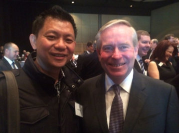 Tan pictured with then WA Premier Colin Barnett in a 2014 photo he showed to investors.