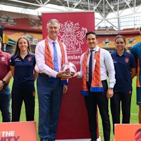 Sports Minister Tim Mander and Roar chief executive Kaz Patafta.