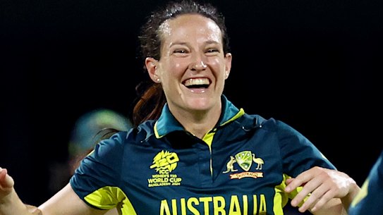 Megan Schutt celebrates with teammate Alyssa Healy after dismissing Georgia Plimmer.