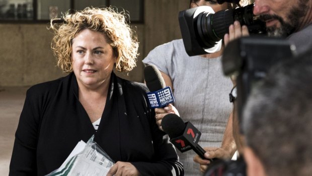 Rosemary Rogers, former chief of staff to ex-NAB CEOs Cameron Clyne and Andrew Thorburn, leaves Surry Hills police station after being granted bail.