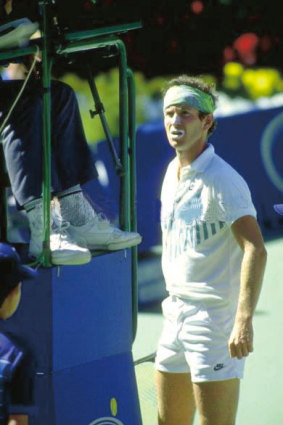 John McEnroe argues with umpire Gerry Armstrong.