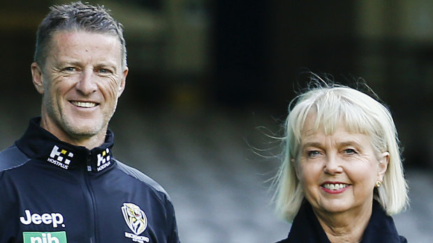  Richmond coach Damien Hardwick with Tigers president Peggy O’Neal.
