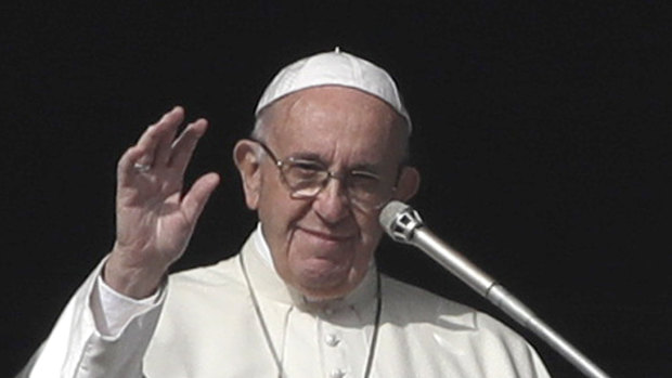 Pope Francis delivers the Angelus noon prayer from his studio window overlooking St Peter's Square at the Vatican on Sunday.